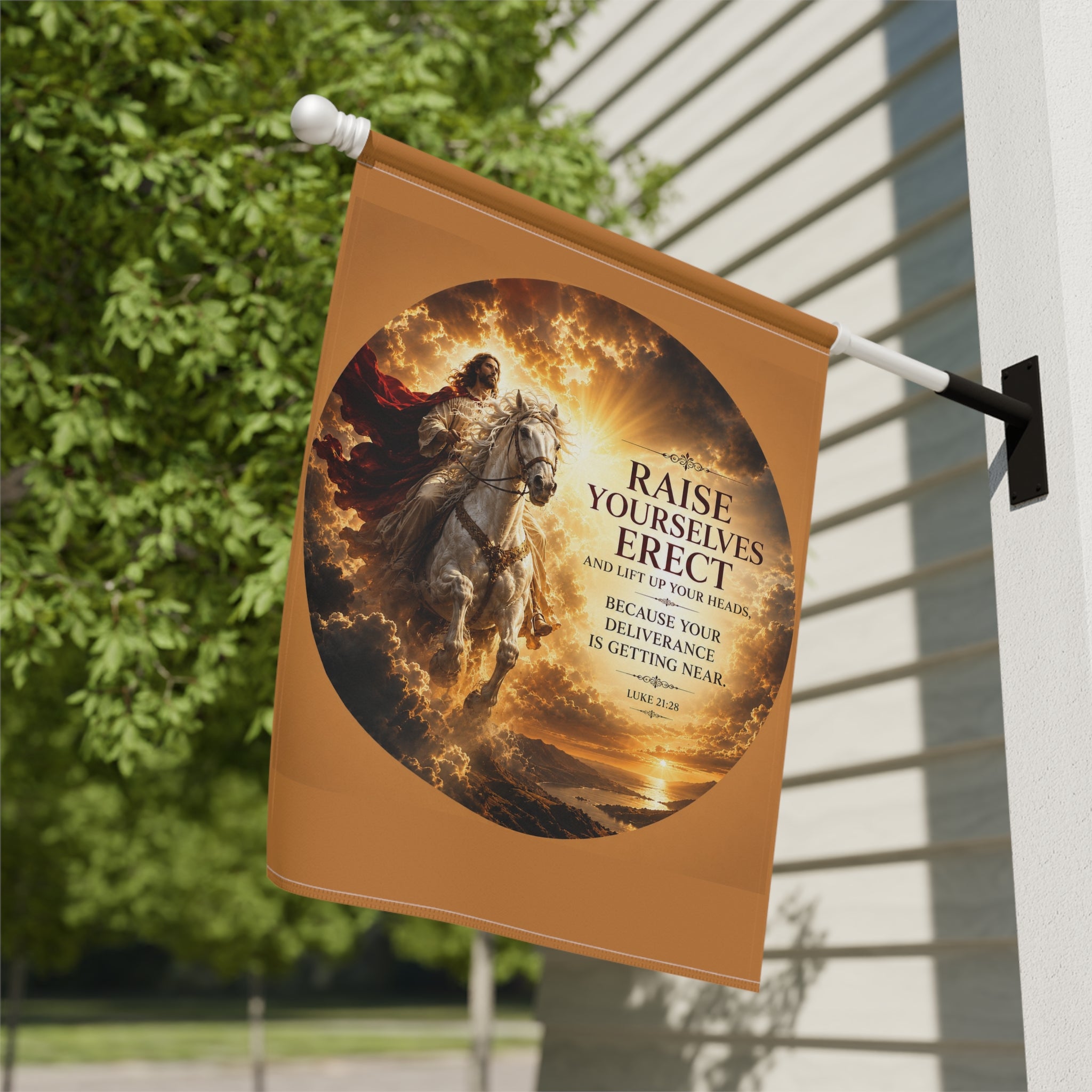 Inspirational Christian garden flag featuring Jesus riding a white horse beneath glowing skies with Luke 21:28 scripture artwork in warm vibrant tones.