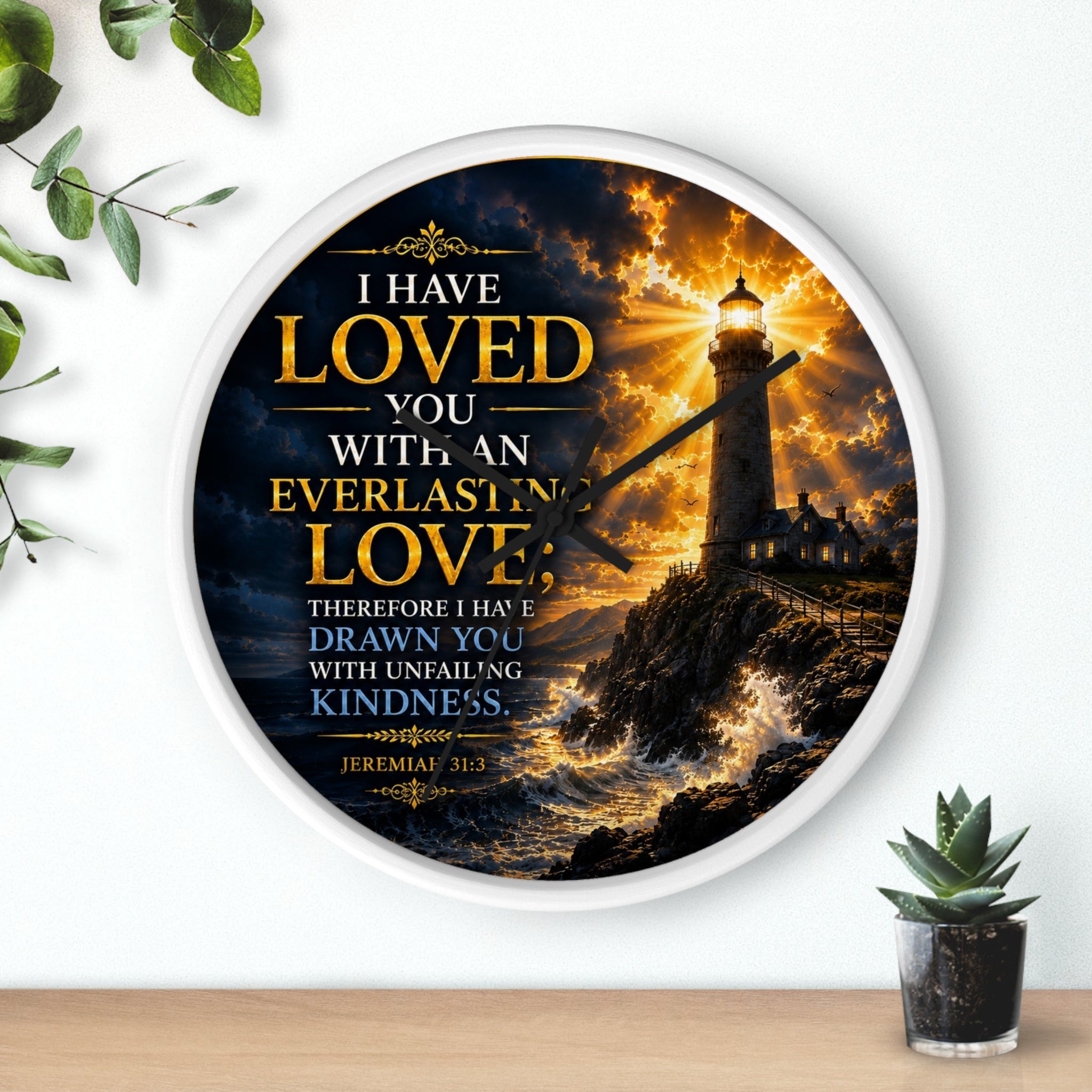 Inspirational Christian wall clock featuring a glowing lighthouse over stormy seas with Jeremiah 31:3 scripture about everlasting love in warm golden tones.