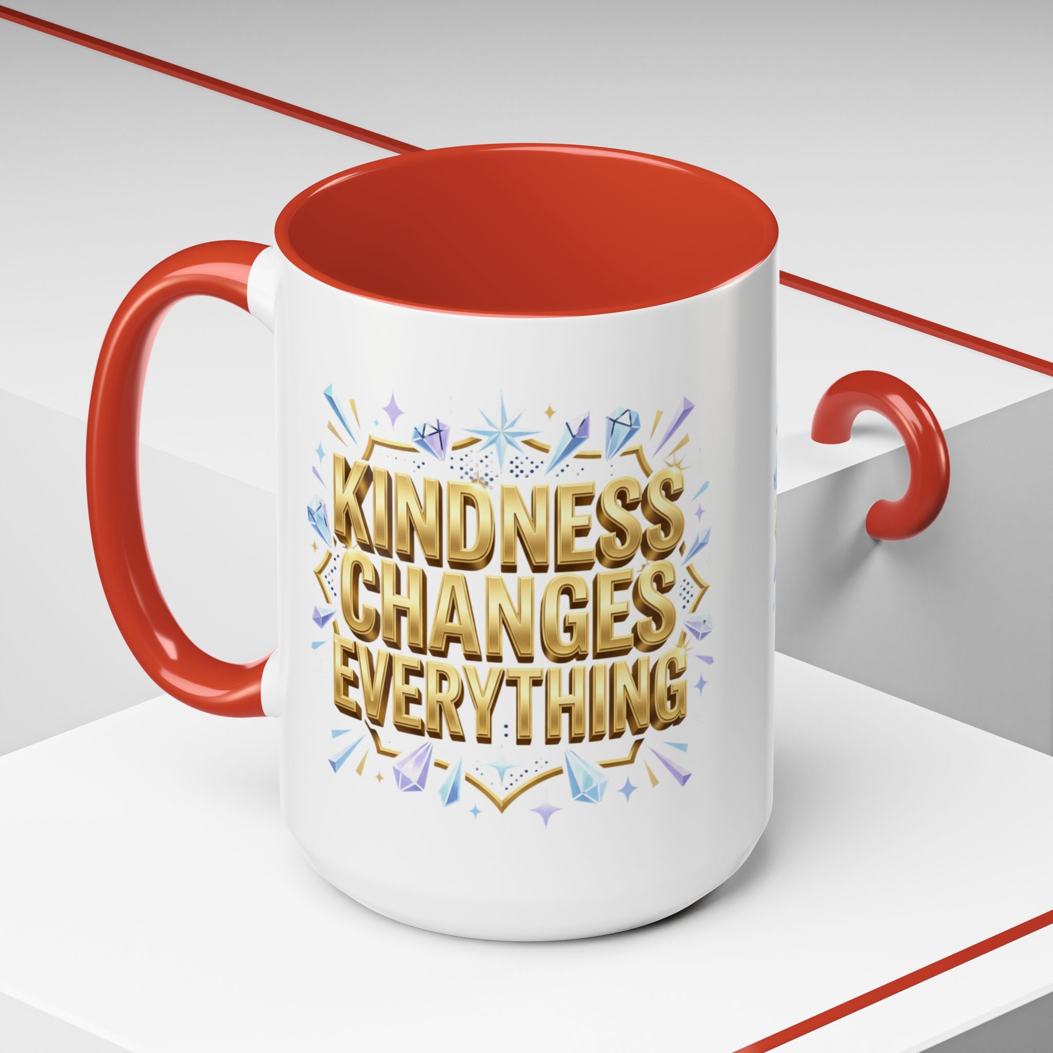 Inspirational ceramic accent coffee mug featuring “Kindness Changes Everything” in elegant gold script with sparkles and colorful accent handle and interior.