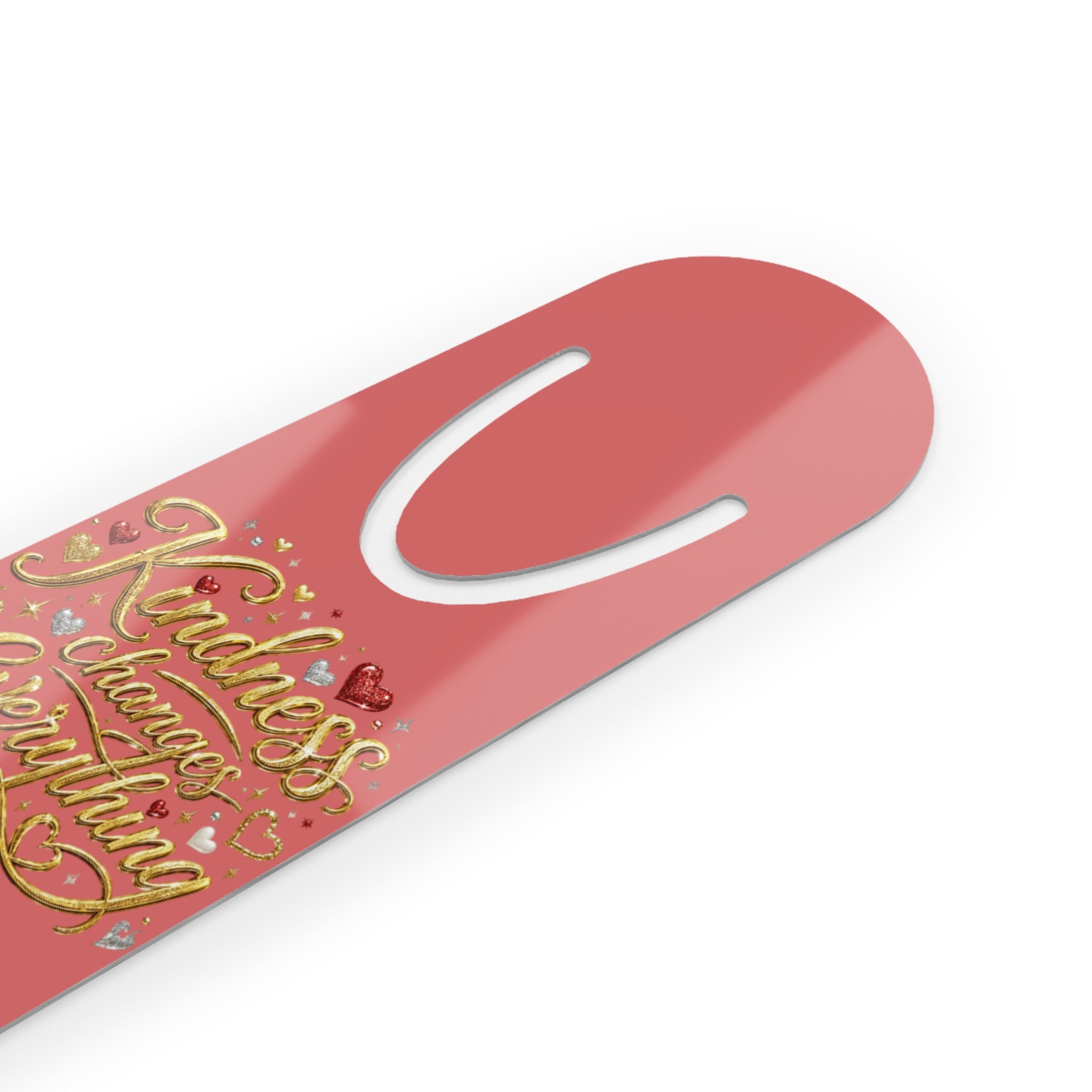 Inspirational aluminum bookmark featuring the message “Kindness Changes Everything” on a coral background with optional personalized name or scripture, brushed metal backing, and secure page-holding slot.