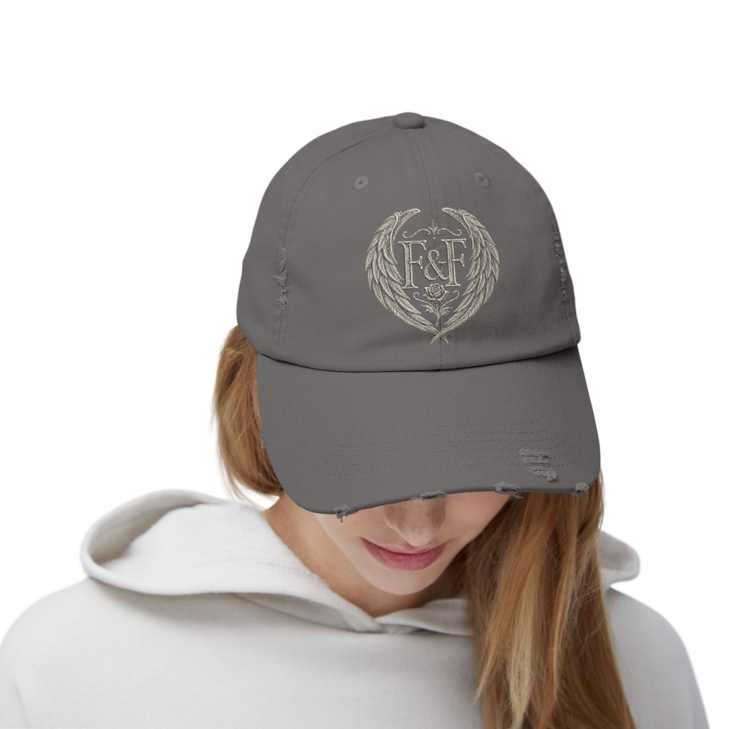 Distressed black Christian cap featuring the Faith & Freedom wing crest logo with feathered wings and vintage washed low-profile styling.