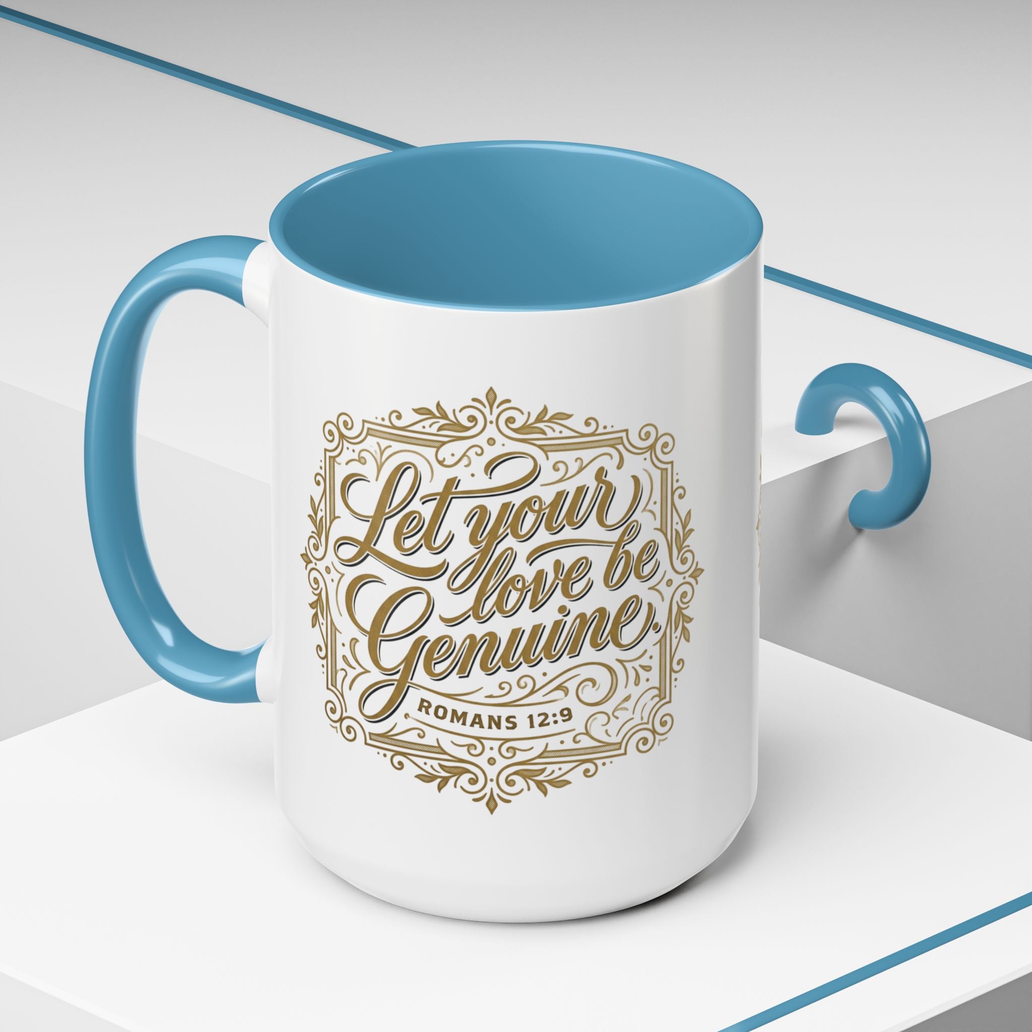 Inspirational ceramic accent coffee mug featuring Romans 12:9 and the message “Let Your Love Be Genuine” in elegant gold script with decorative flourishes and black accent handle and interior.
