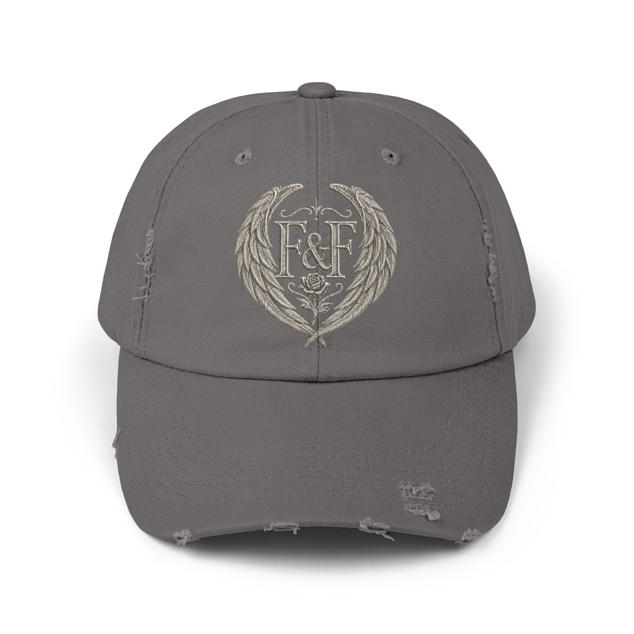 Distressed black Christian cap featuring the Faith & Freedom wing crest logo with feathered wings and vintage washed low-profile styling.