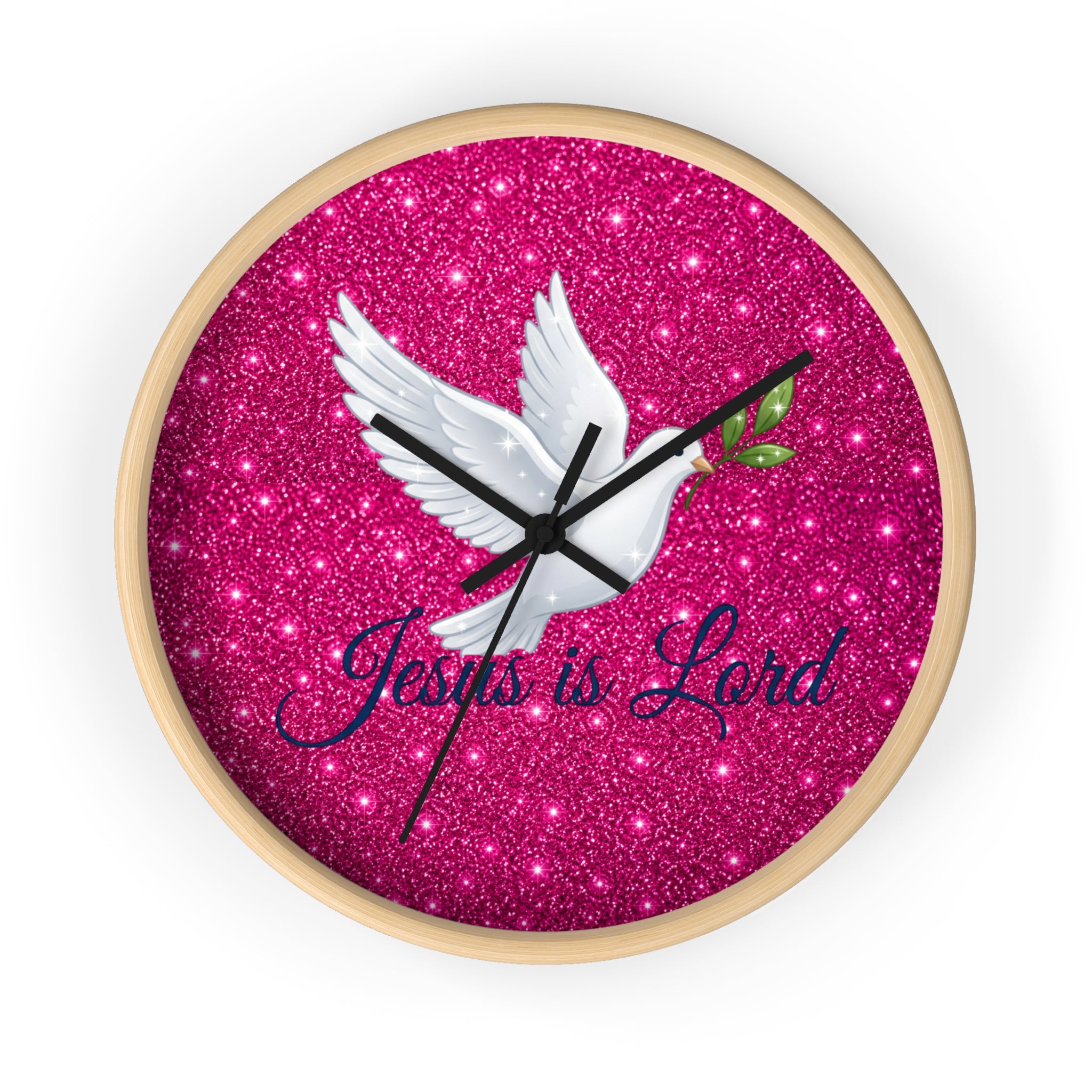 Round wall clock featuring a white dove carrying an olive branch with the words "Jesus Is Lord" on a sparkling pink background, finished with a wood frame and silent quartz movement.
