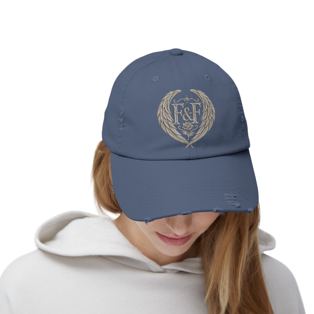 Distressed black Christian cap featuring the Faith & Freedom wing crest logo with feathered wings and vintage washed low-profile styling.