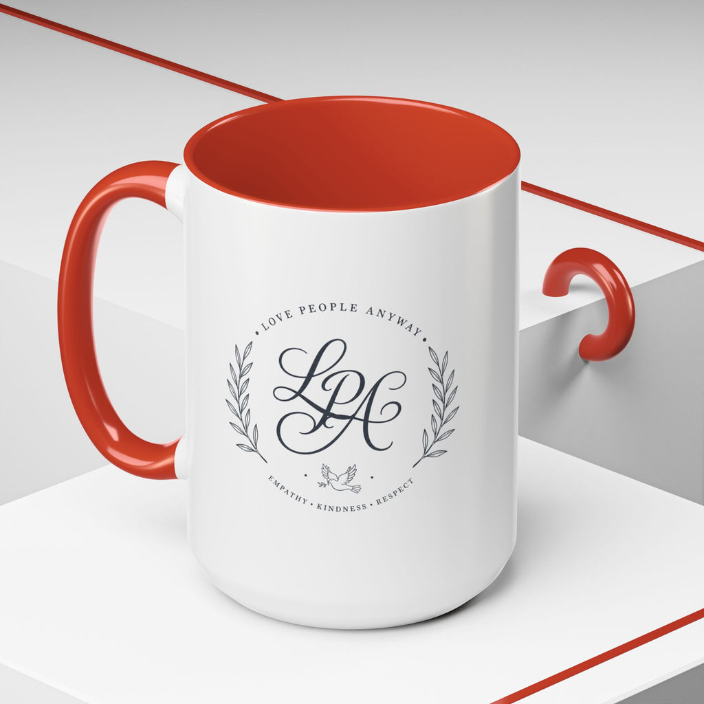 Personalized ceramic accent coffee mug featuring a custom monogram crest and the inspirational message “Love People Anyway” with colorful handle and interior accents.