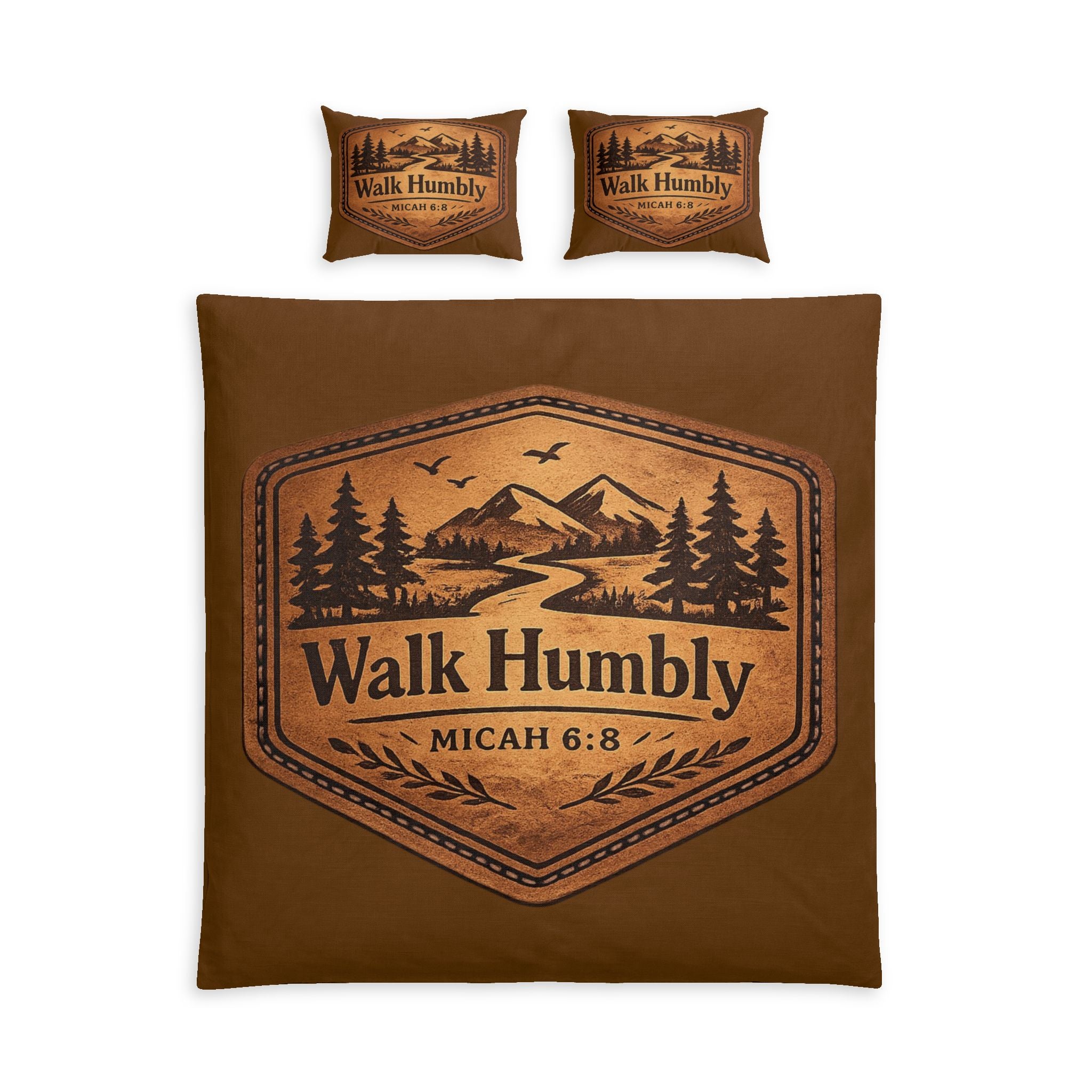 Rustic cotton duvet cover set featuring a leather-style mountain badge with pine trees and the words "Walk Humbly" inspired by Micah 6:8 on warm earth-tone bedding.