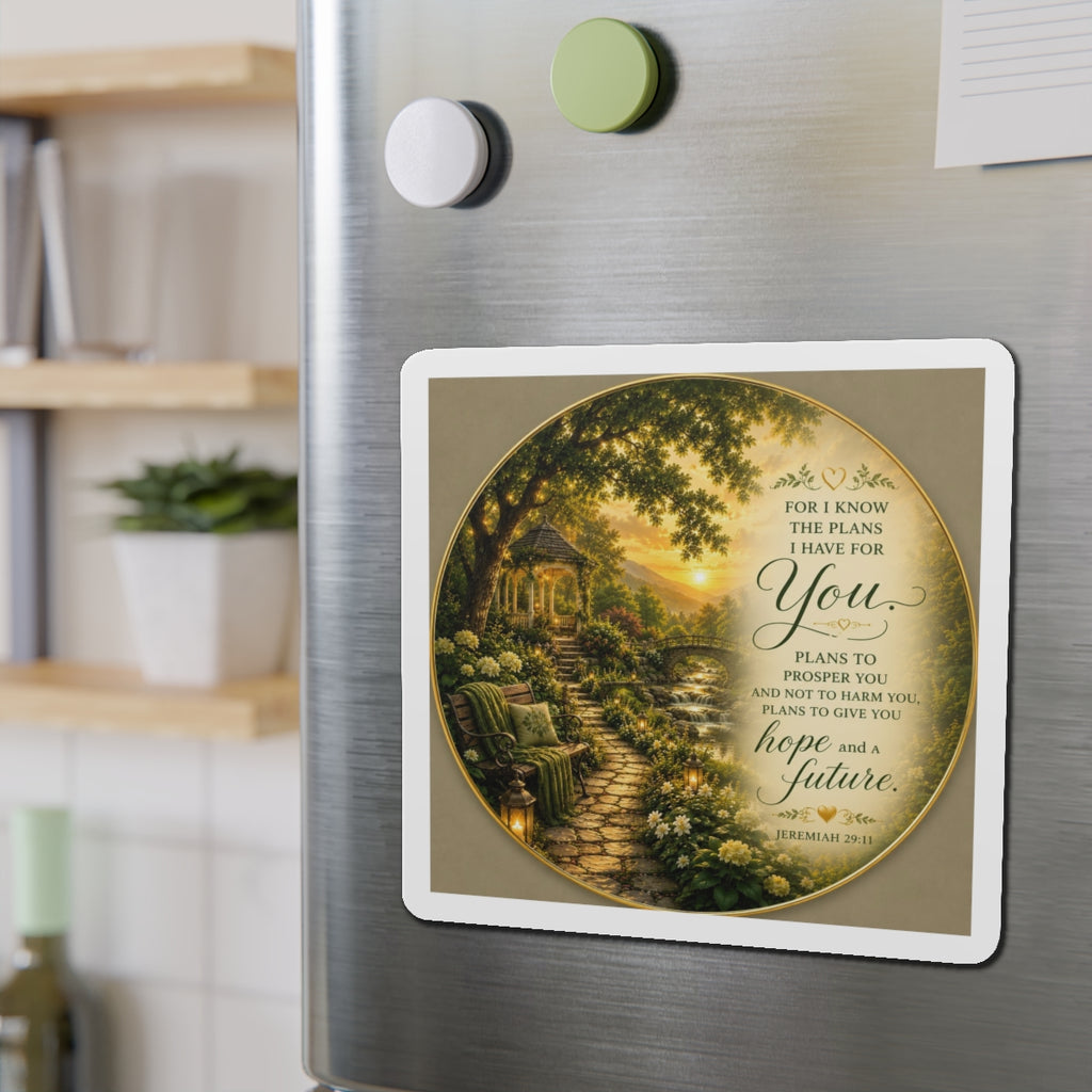Decorative magnet with garden scene and text on a refrigerator