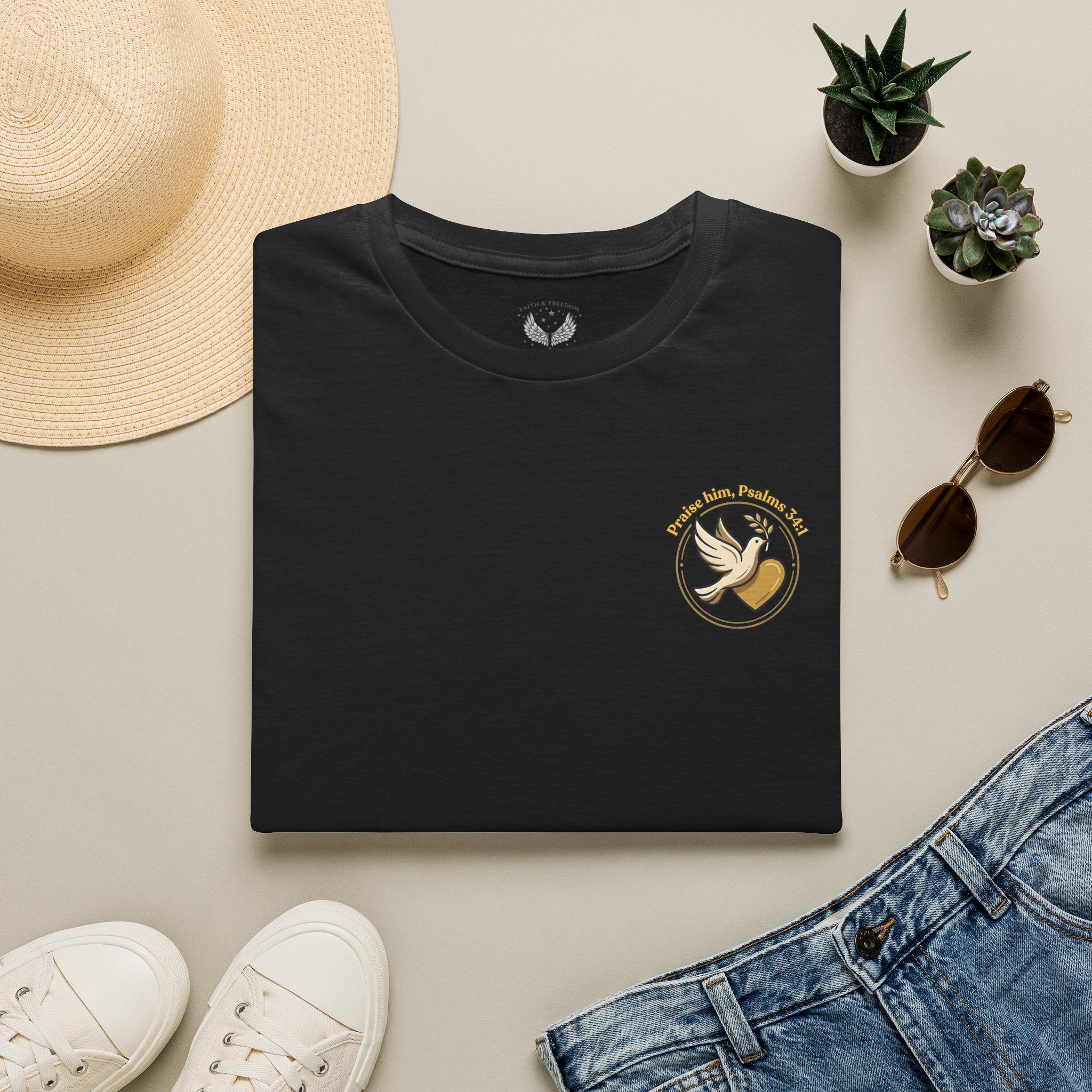 Minimalist Christian T-shirt featuring a Dove of Peace chest emblem with the words “Pray, Love, Remember” on a soft lightweight faith-inspired tee.