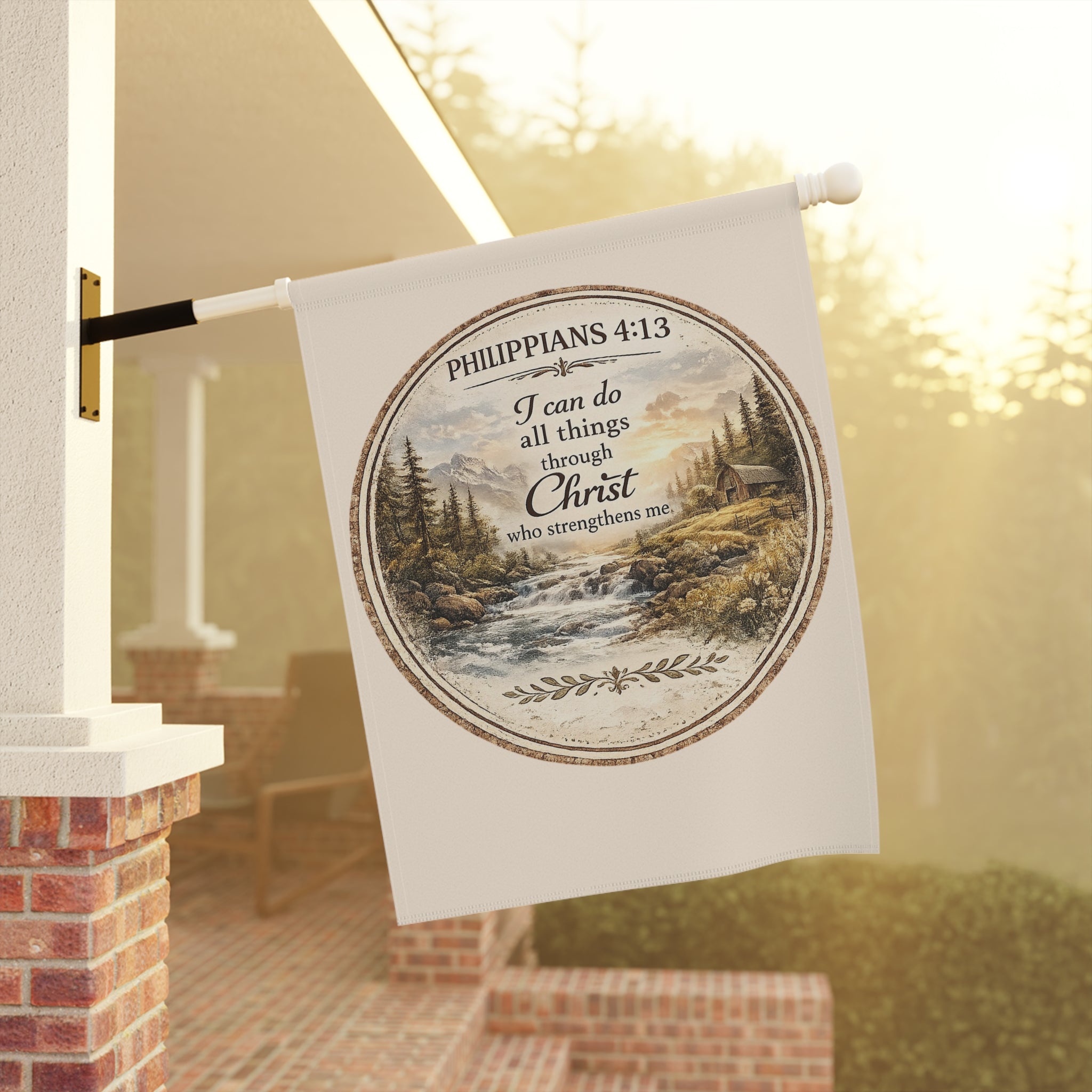 Christian garden flag featuring Philippians 4:13 with a mountain stream, pine trees, and sunrise landscape in a rustic farmhouse-style outdoor banner.