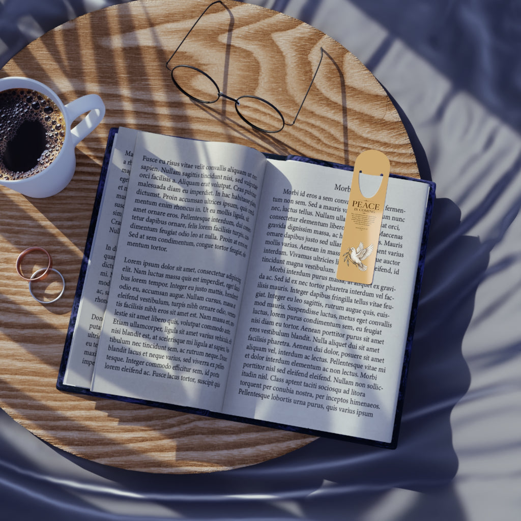 Inspirational Christian aluminum bookmark featuring the message “Peace Is Coming” inspired by Isaiah 65:21-25 with minimalist arch artwork, brushed metal backing, and secure page-holding slot.