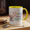Cute ceramic coffee mug featuring a pastel baby elephant and the uplifting message “Kindness Changes Everything” with colorful accent handle and interior.