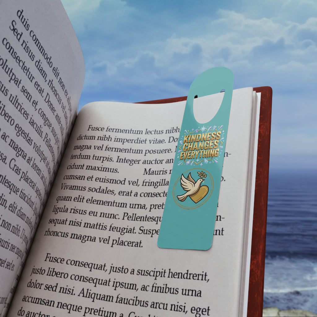 Inspirational turquoise aluminum bookmark featuring a peace dove and the message “Kindness Changes Everything,” with brushed metal backing and secure page-holding slot for books, journals, and devotionals.