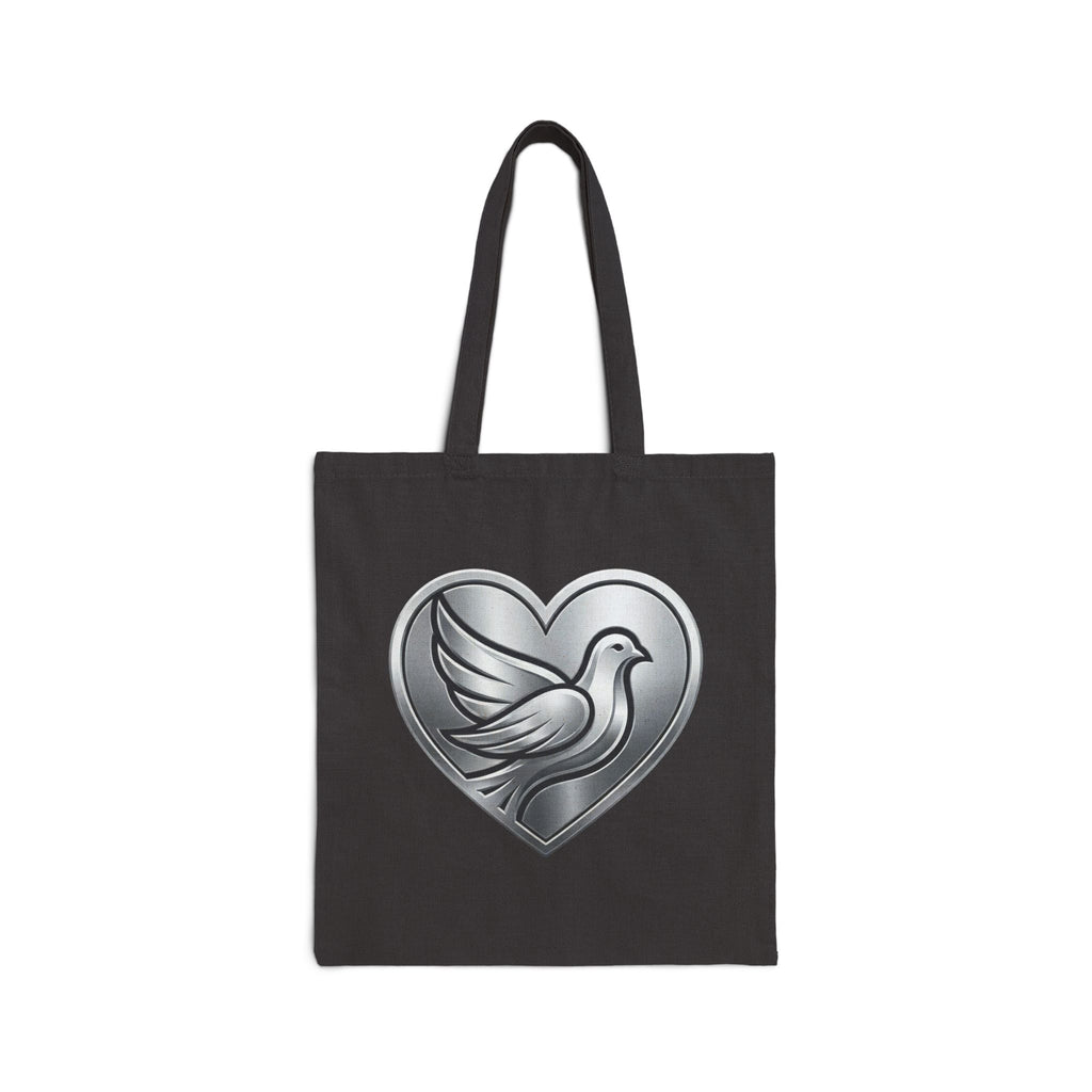 Cotton canvas tote bag featuring a silver dove inside a heart design, symbolizing peace, love, faith, hope, and encouragement in an elegant minimalist style.
