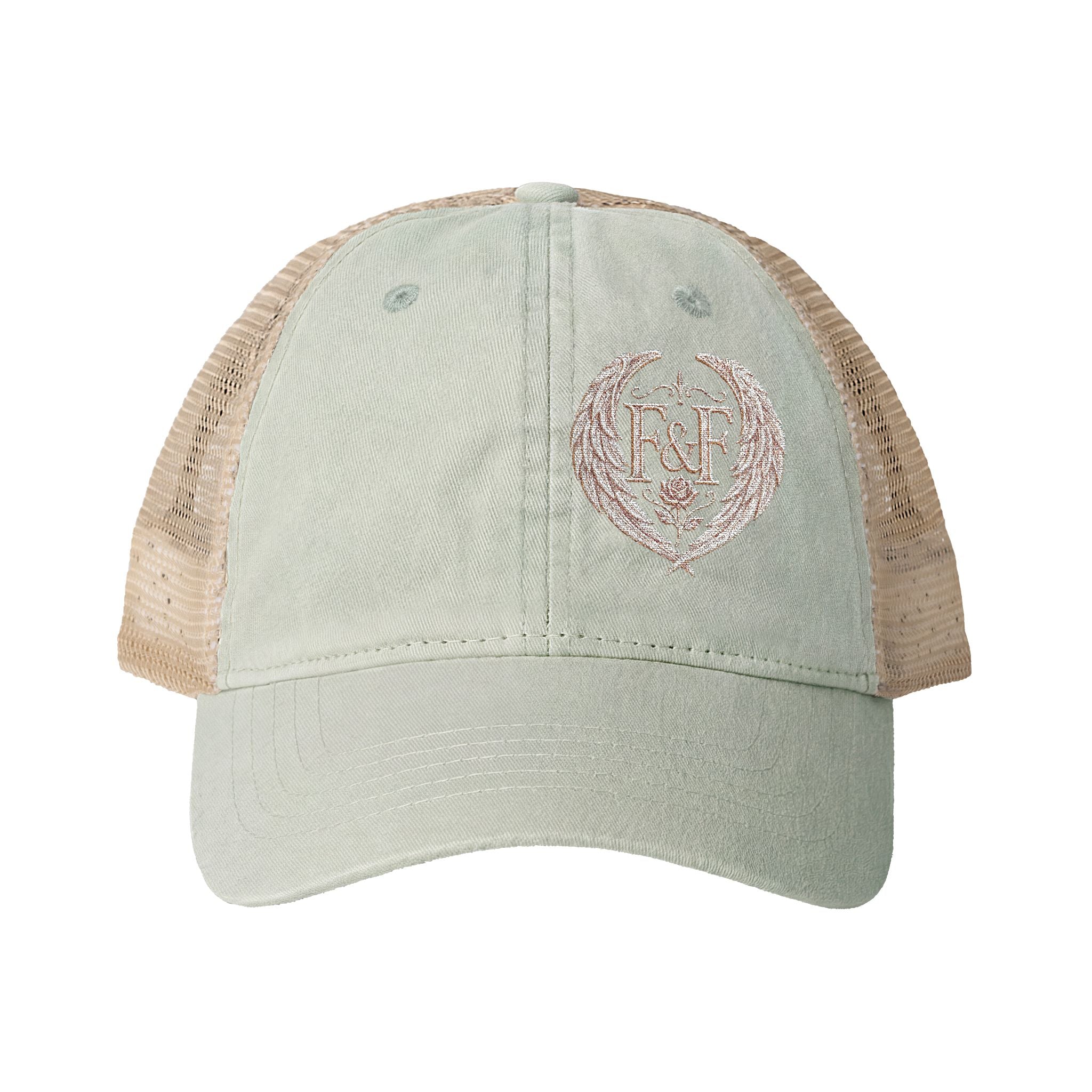 Women’s washed mesh-back cap featuring the Faith & Freedom logo with vintage styling, breathable mesh panels, and concealed ponytail opening.