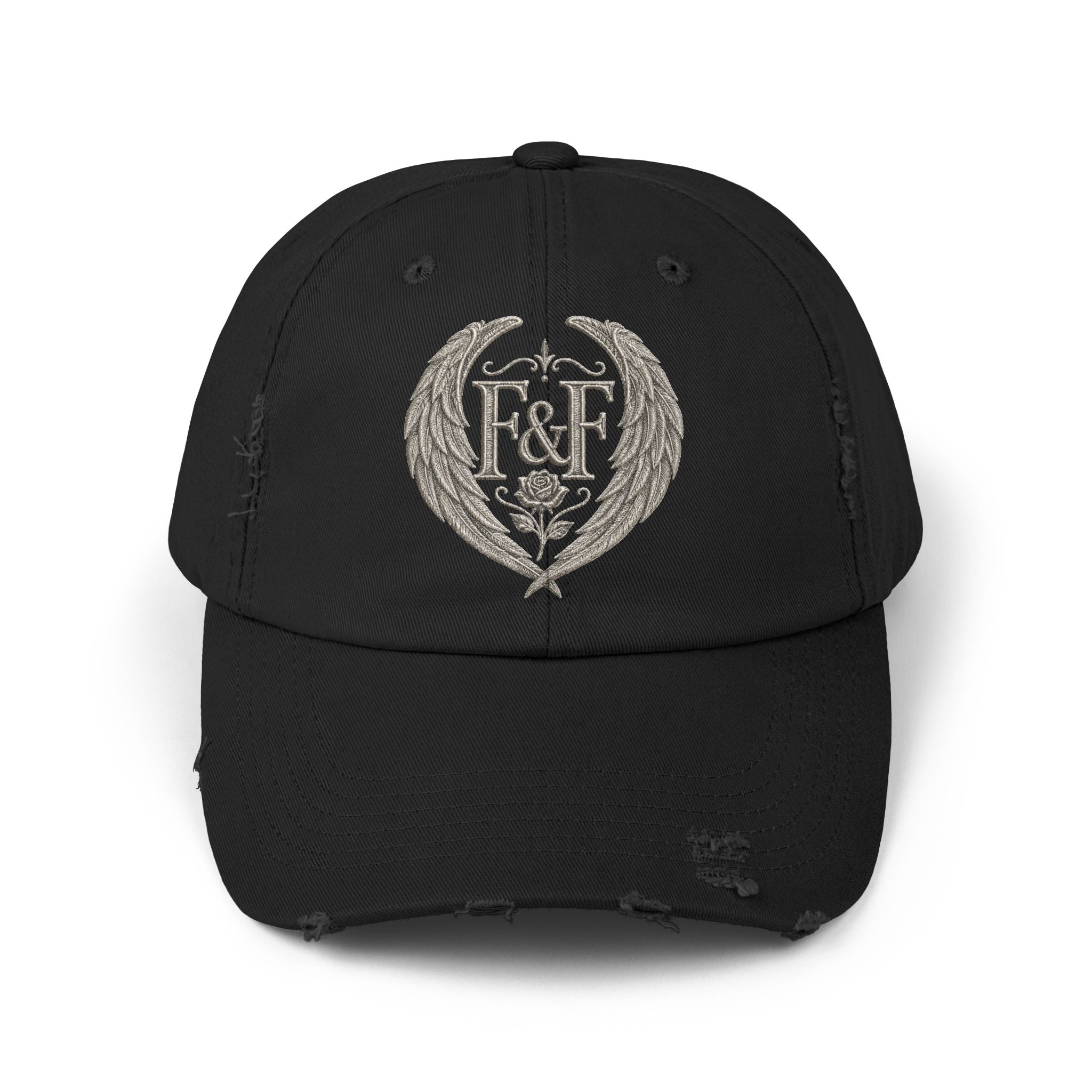 Distressed black Christian cap featuring the Faith & Freedom wing crest logo with feathered wings and vintage washed low-profile styling.