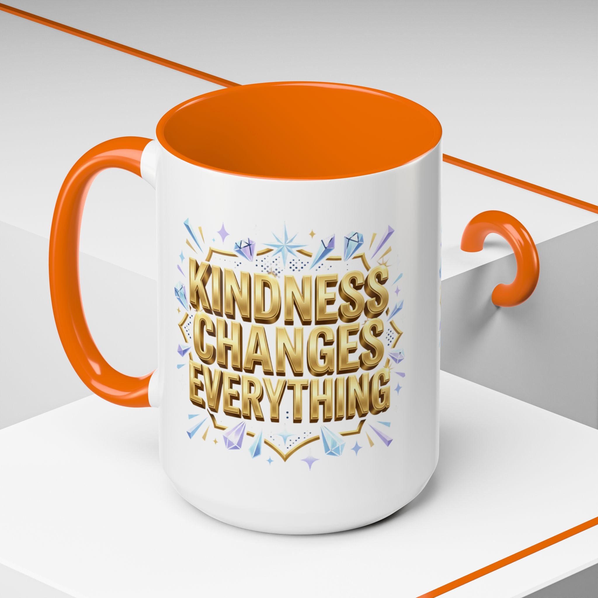 Inspirational ceramic accent coffee mug featuring “Kindness Changes Everything” in elegant gold script with sparkles and colorful accent handle and interior.