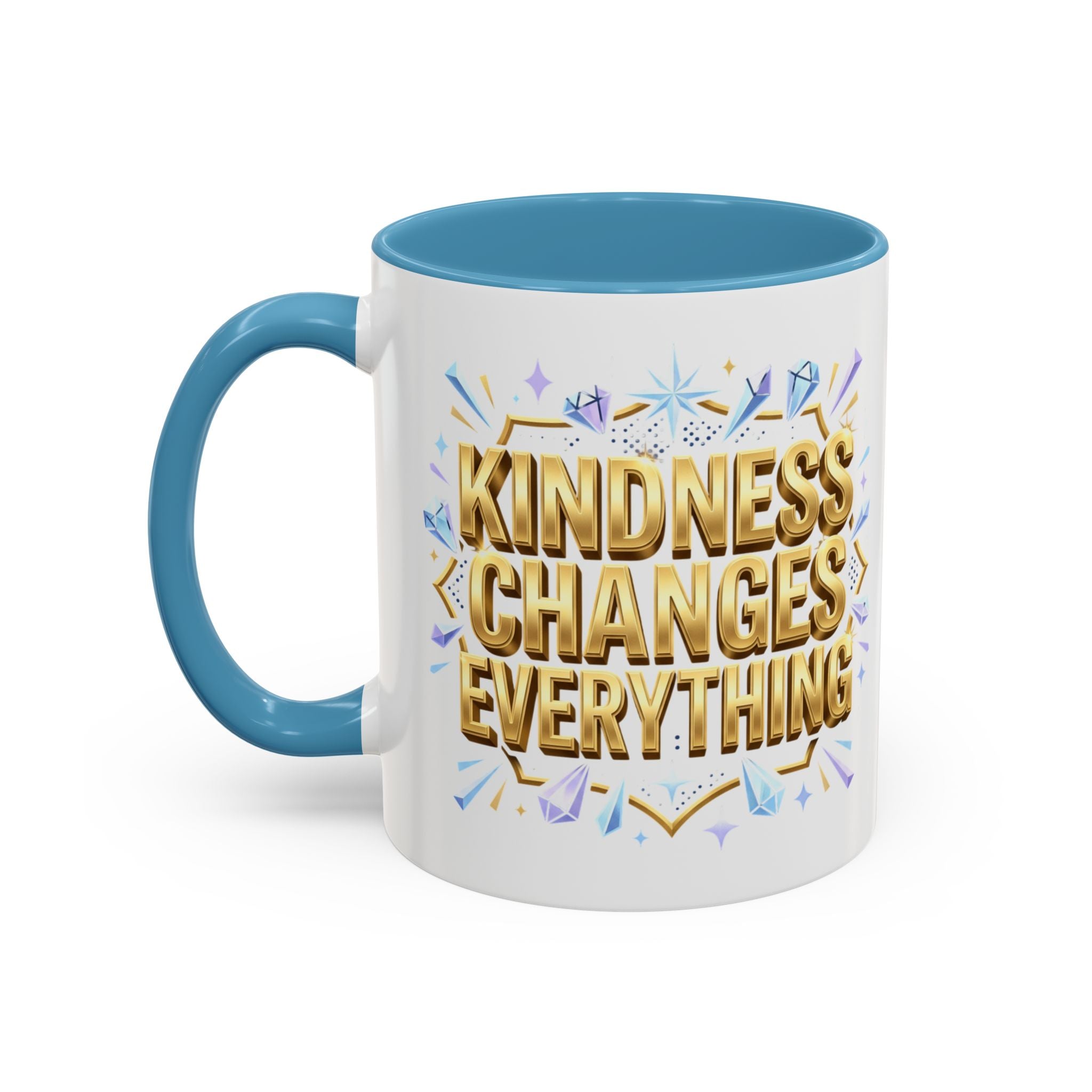 Inspirational ceramic accent coffee mug featuring “Kindness Changes Everything” in elegant gold script with sparkles and colorful accent handle and interior.