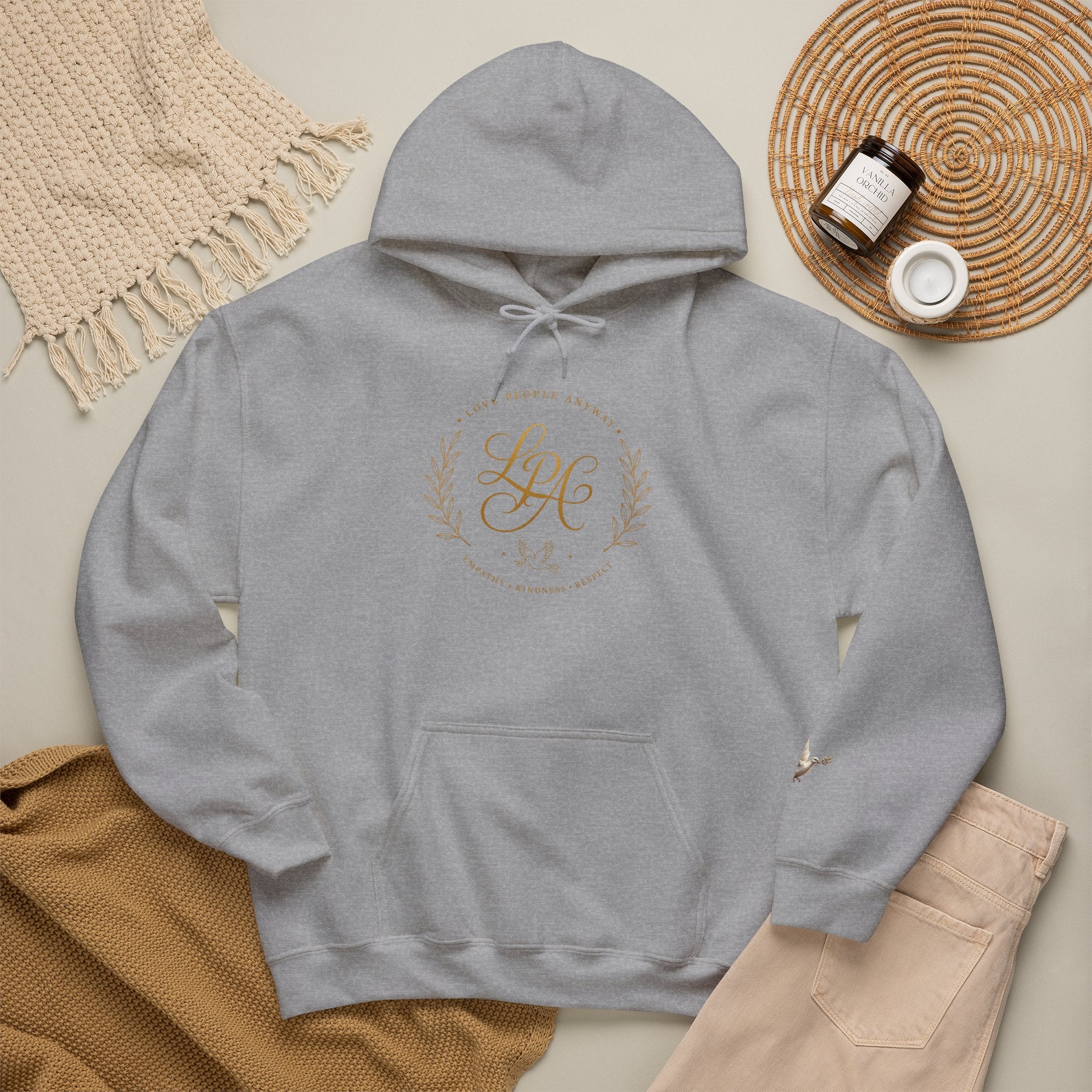 Inspirational Christian hoodie featuring elegant “Love People Anyway” script typography on a soft, cozy hooded sweatshirt designed to encourage kindness and compassion.