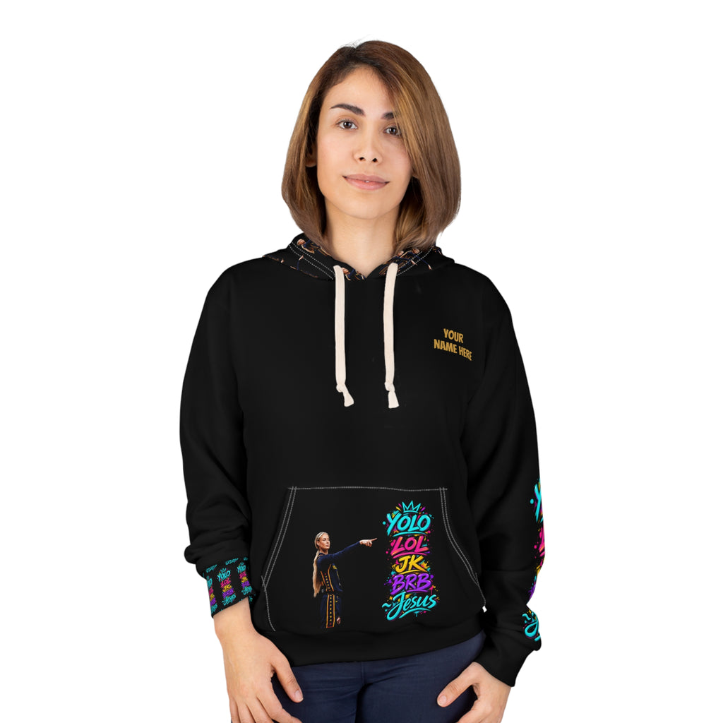 Black personalized pullover hoodie with colorful YOLO LOL JK BRB ~Jesus graffiti artwork, illustrated woman pointing toward the words, coordinating sleeve and cuff graphics, patterned hood, kangaroo pocket artwork, and custom name on the front chest.