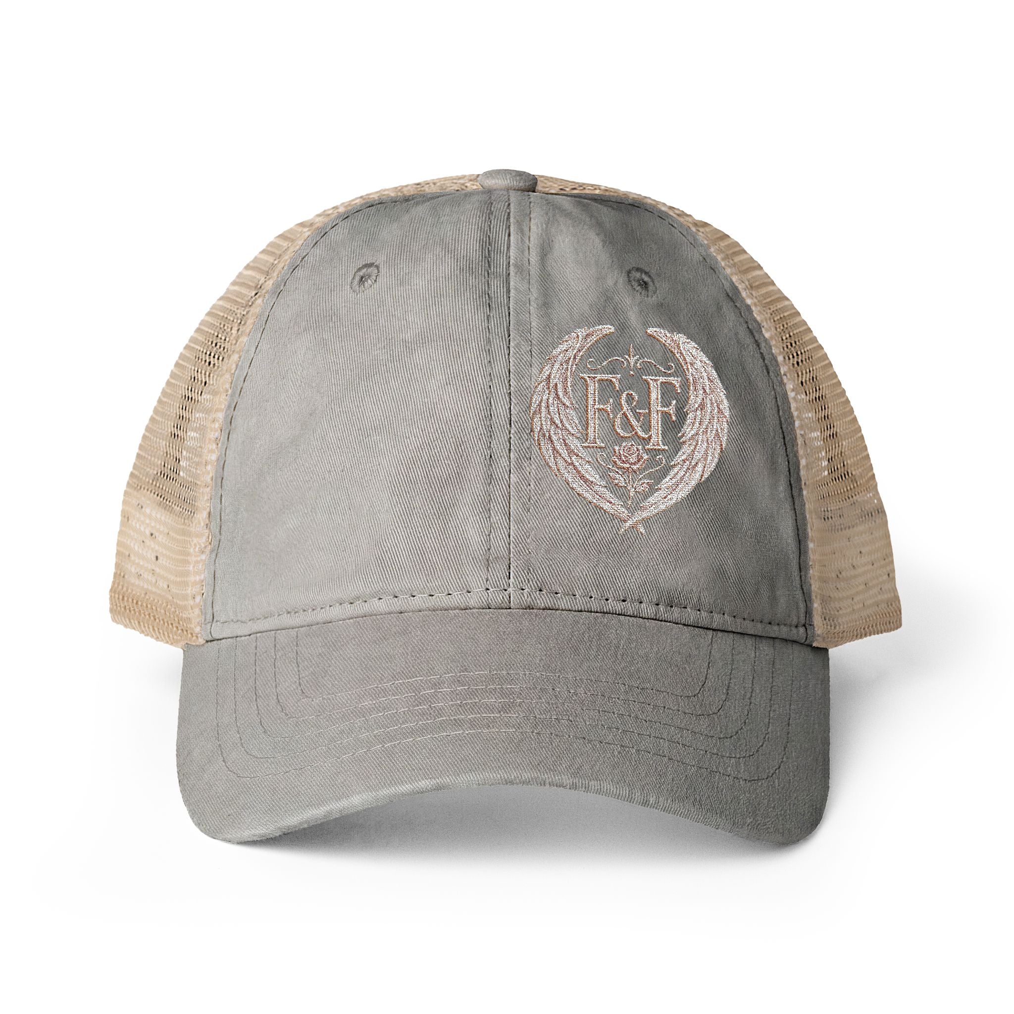 Women’s washed mesh-back cap featuring the Faith & Freedom logo with vintage styling, breathable mesh panels, and concealed ponytail opening.