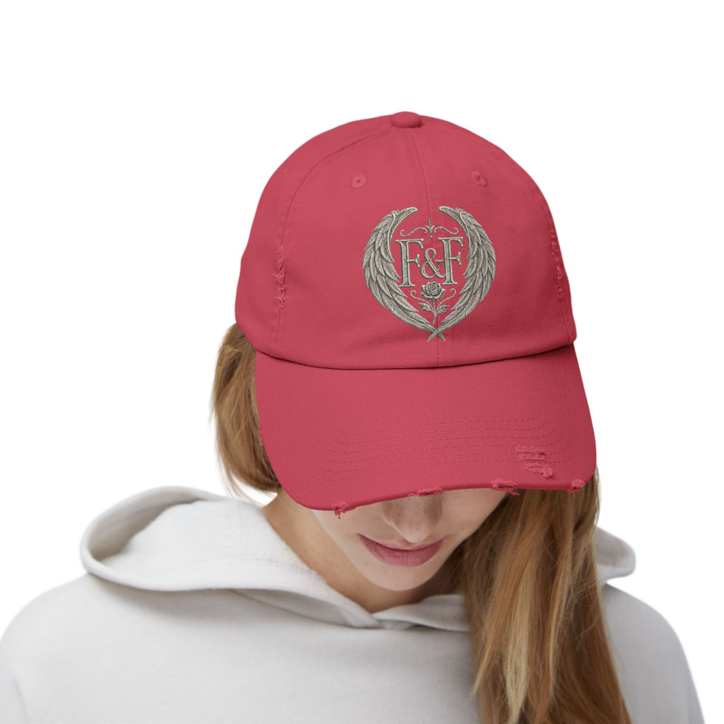 Distressed black Christian cap featuring the Faith & Freedom wing crest logo with feathered wings and vintage washed low-profile styling.