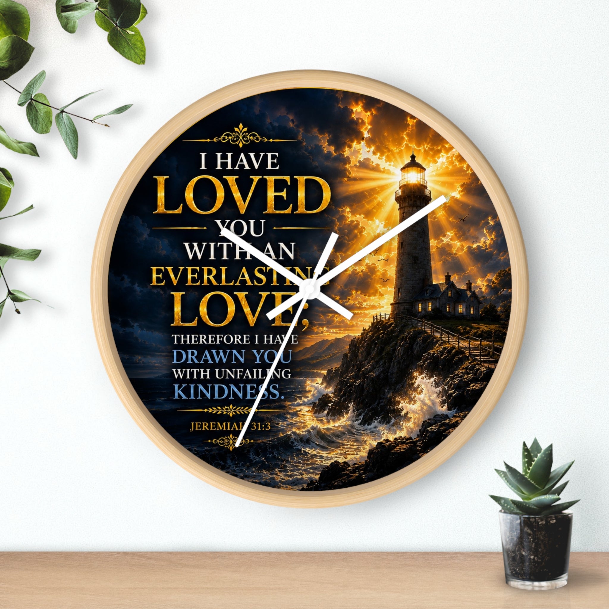 Inspirational Christian wall clock featuring a glowing lighthouse over stormy seas with Jeremiah 31:3 scripture about everlasting love in warm golden tones.